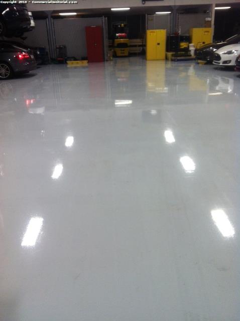 Scrubbed floor and burnished side garage area