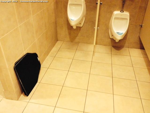  The client left the urinal mats standing by the wall so one of our crew member placed them underneath the urinals 
