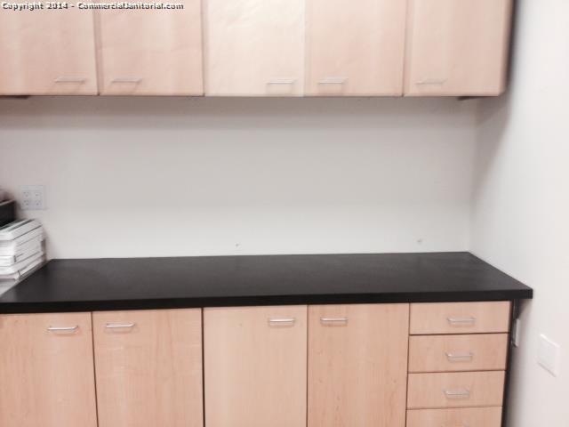 All Counters Tops in break room have been cleaned , Cabinets have been wiped down . 