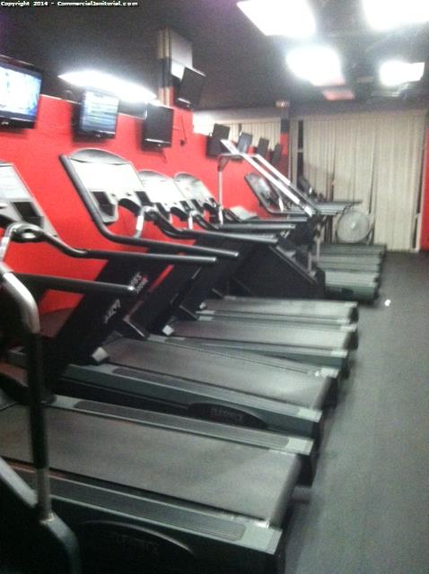Cleaner wiped and disinfected gym equipment