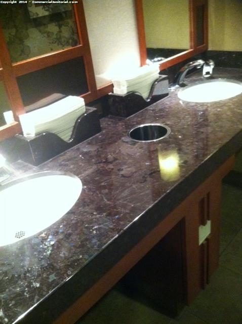 Sink counter tops were cleaned , inside the sinks was cleaned the faucets was wiped down , mirrors were cleaned , Paper towels were restocked . 