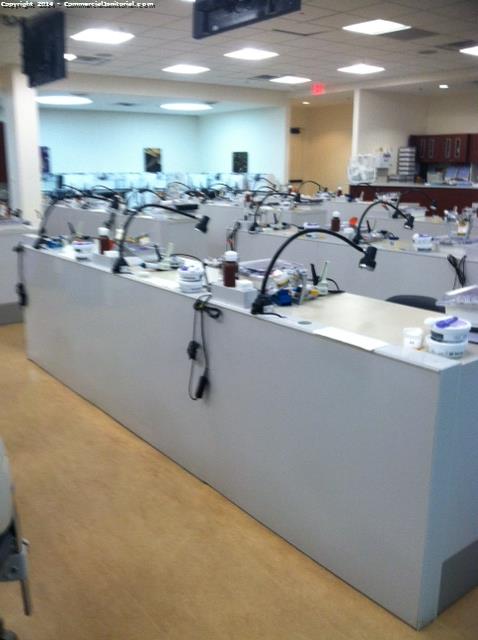 We clean all surfaces in this training room, including opening up doors and cabinets