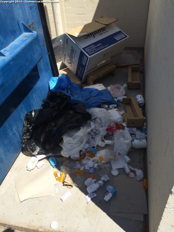 Cleaners had to clean up trash and properly place it into the dumpster before leaving site , Problem was resolved 