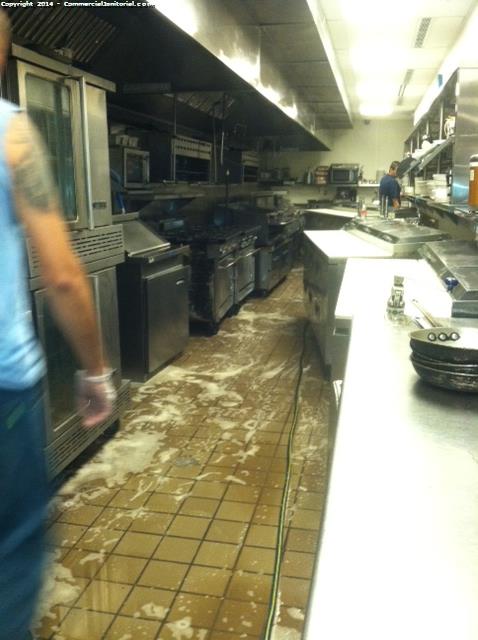 All equipment in the kitchen was moved and floors got scrubbed. 