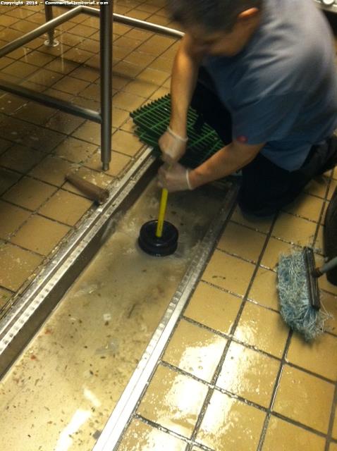 Here is our night crew trying to unclog the drains in a commercial kitchen 