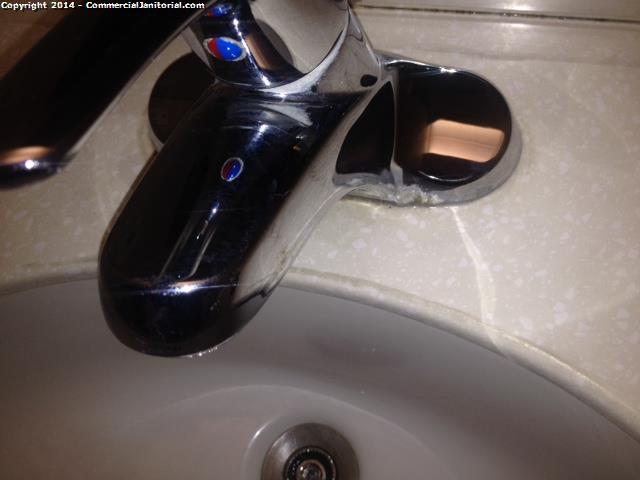  Calcium build on sink faucets - chemical was apply to removed Note : crew will continue cleaning Ready to fix any issue Has all equipment & chemicals to perform job Wearing uniform Consumables ok Crew is working on VCT floors 