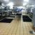 Having a professional Commercial Kitchen company come in an clean your floors is beneficial to your restaurant or food service company in a few ways:

1. Your staff is free to focus on the jobs they are trained to do, making for more efficient crew.

2. You do not have all the set up and take down time as your staff shifts gears from cooking to cleaning

3. A professional cleaner is better at cleaning, this means safer environment to work in

