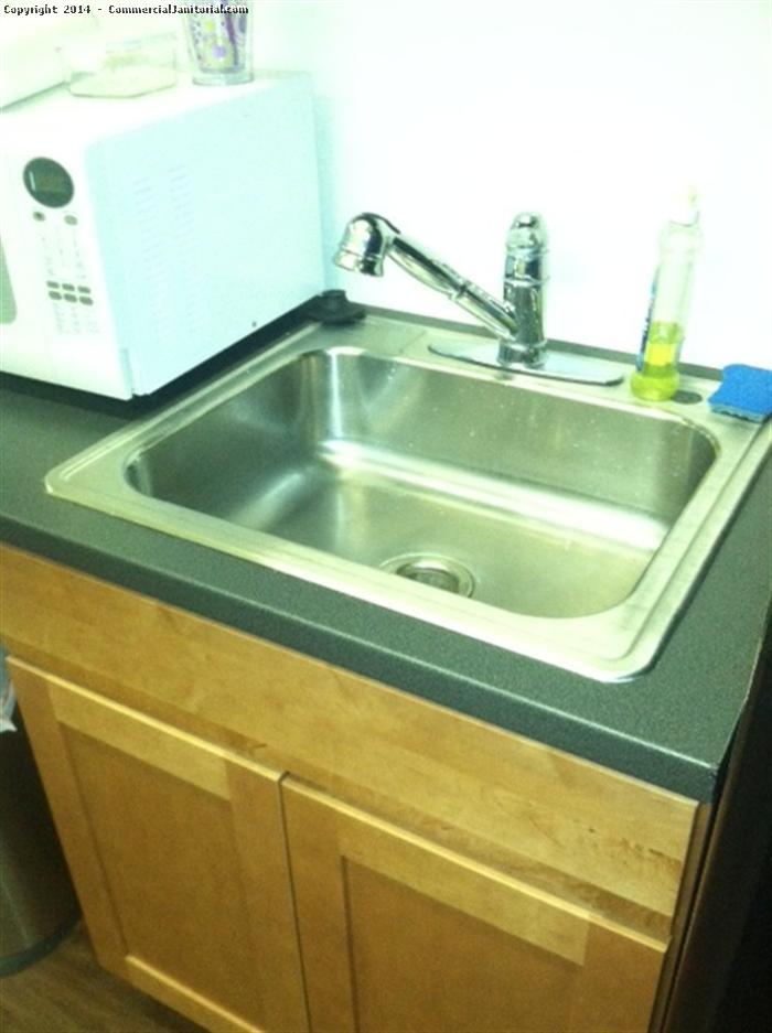  kitchen sink and microwave oven is cleaned by our crew. They Scrub it out with a scouring powder. Clean the kitchen sink last of everything at counter level, since you may be rinsing crumbs and debris into it.