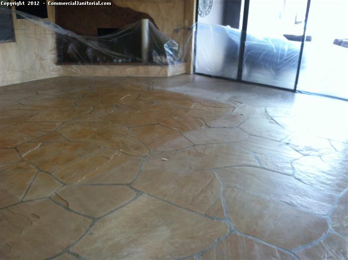 This a picture of the floor before being clean, it is very important that before you start any cleaning of this type of stone to cover all of your walls the way we did.  We provide a variety of Natural stone cleaning services for residential and commercial customers. 

