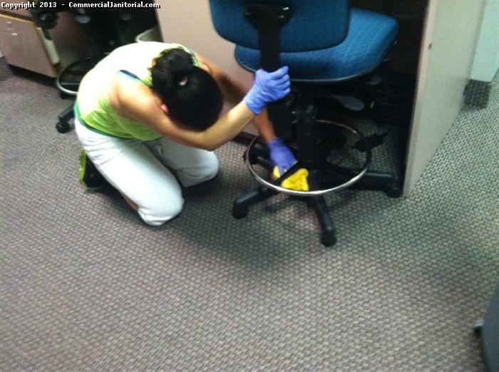 A clean office is a must in order to have happy and productive employees.This picture shows our Commercial janitorial experts cleans the office chair even edges using latest Anti-bacterial solution to ensure bacteria free of work environment. The clean office space is the first Impression for your clients and company.