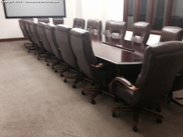 Conference room was cleaned , table has been disinfected , Floor and walls cleaned, Chairs wiped down .