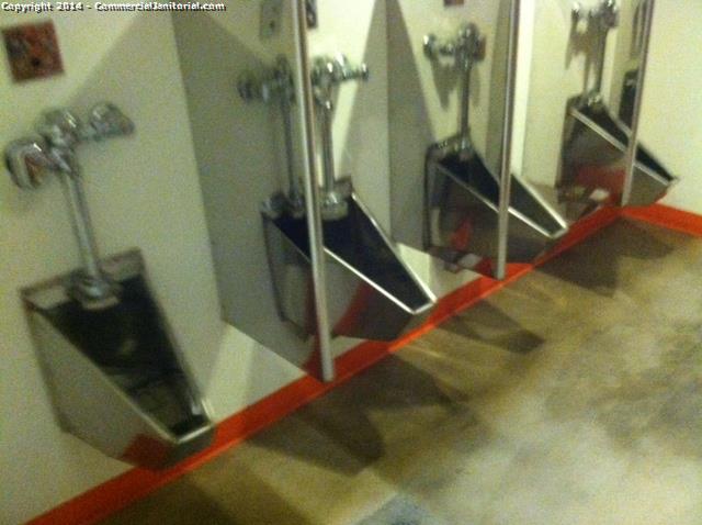 cleaning 4 stainless steel urinals when performing a construction clenaing 