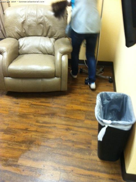 we move the large chair to clean behind and underneath it as part of our janitorial service