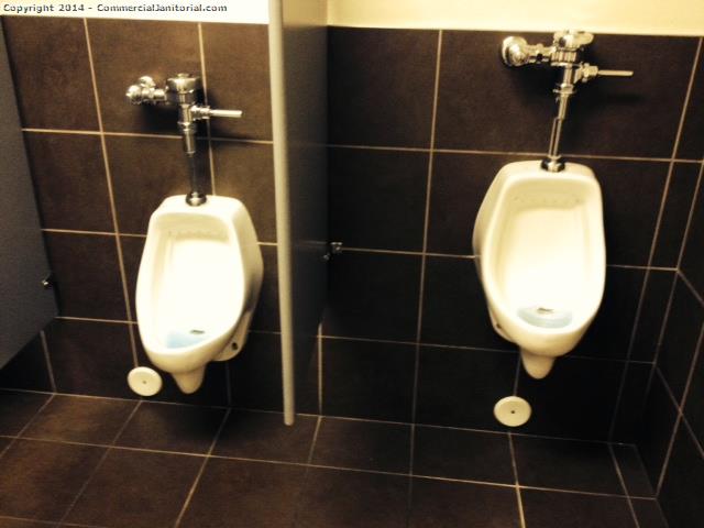 Restroom Urinals have been cleaned , all floors have been swept and moped , cleaning chemical put in to remove all of the smell . 