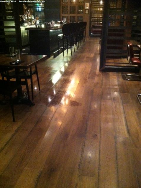 Wood floors swept and mopped, chairs and legs wiped down and polish 