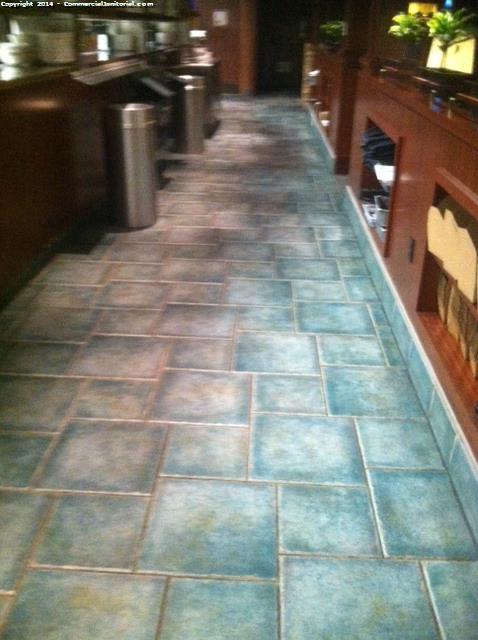 Tile floors look good and stainless steel trash polished 