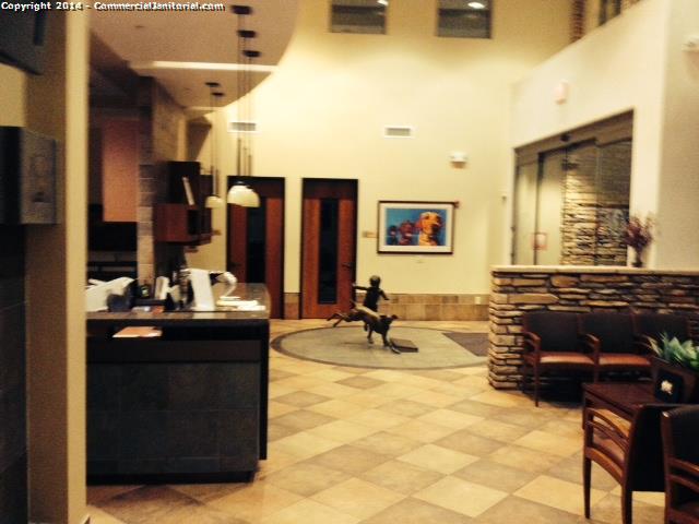 Lobby Area, trash emptied ,Reception desk wipe down , floor swept and mopped , walls were dusted , statues were cleaned 