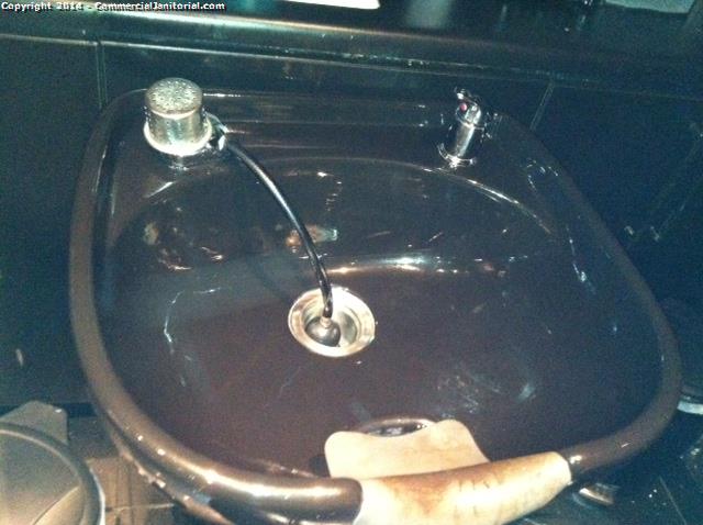 picture of a sink that is cleaned when we clean a hair salon