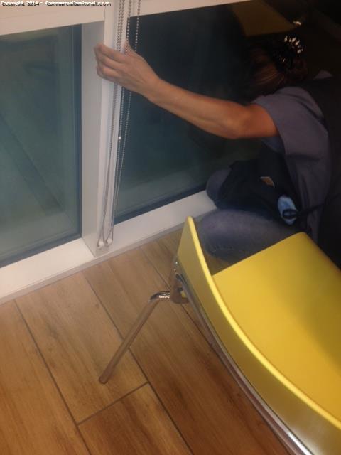Cleaning window sills in class A single tenant office building