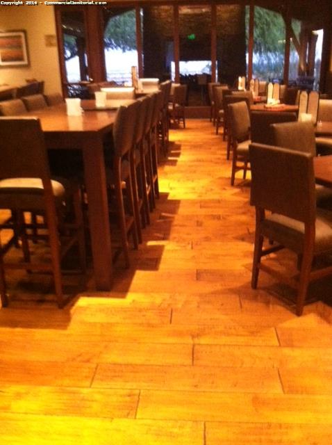 Sweep and mop floors, clean table bases, move chairs and tables