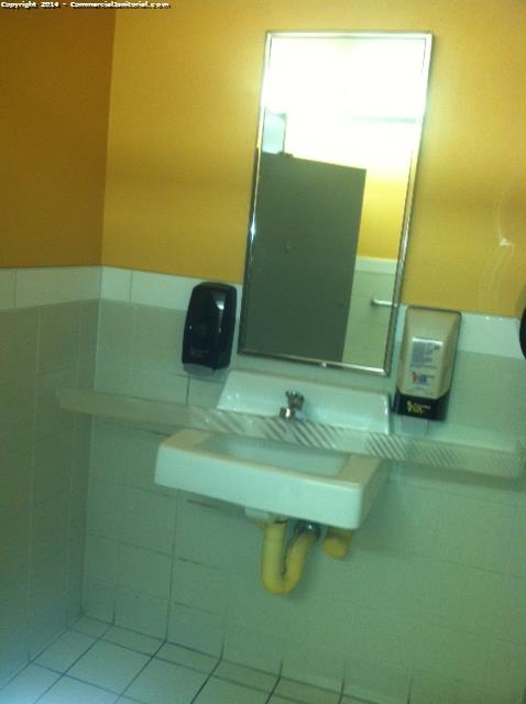 The Sink Facility was cleaned , sink was cleaned with chemicals, Mirror was cleaned , both soap dispensers were Refilled .