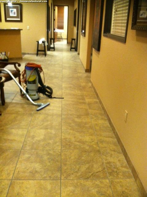 Ryan-

Did a sweep with a treated-dust mop but the dust was getting caught in groves of tile.  Used back-pack vacuum to complete the job and it turned out great.

This vacuum really sucks!  :-)

Joe k.